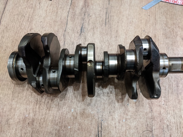 Коленвал двигателя 12200EY00A NISSAN