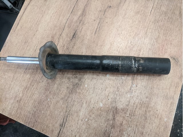 Амортизатор передней подвески 31311091921 BMW