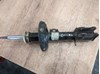Амортизатор передней подвески, левый 72119123 GM