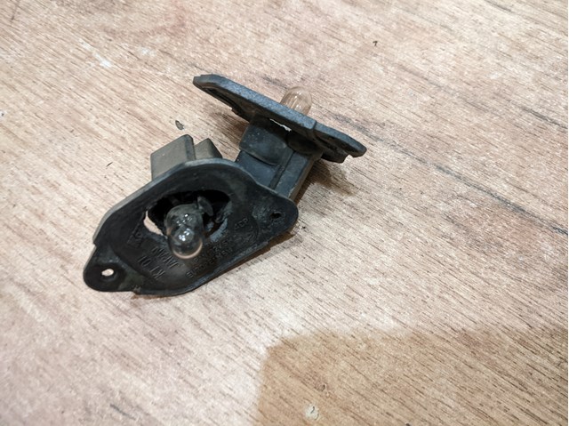 Фонарь подсветки заднего номера B16A51270B MAZDA
