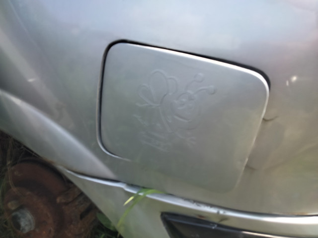 Дверка бензобака 788304M730 NISSAN