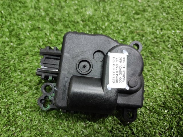 Моторчик заслонки печки GS7H19E616CA FORD
