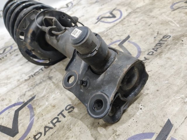 HG9Z18124C FORD Амортизатор передний левый купить в Сумы