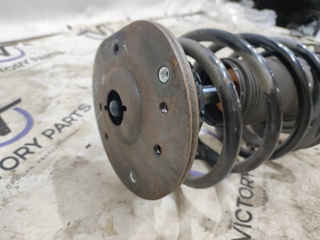 HG9Z18124C Амортизатор передний левый купить Украина