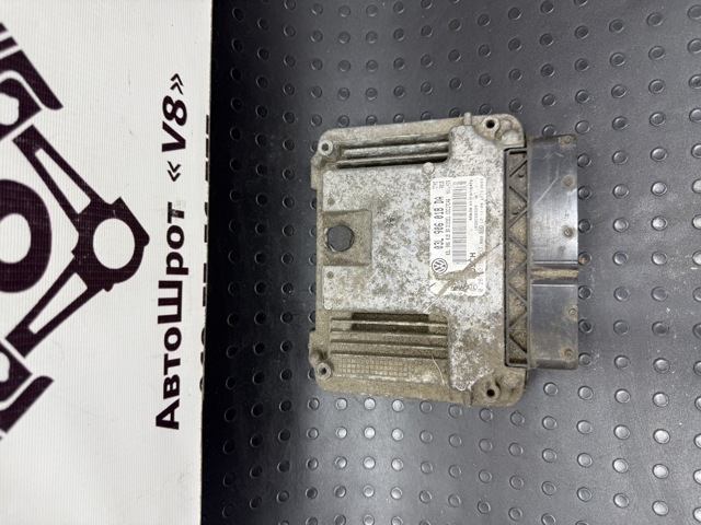 Компьютер двигателя 03L906018DA VAG
