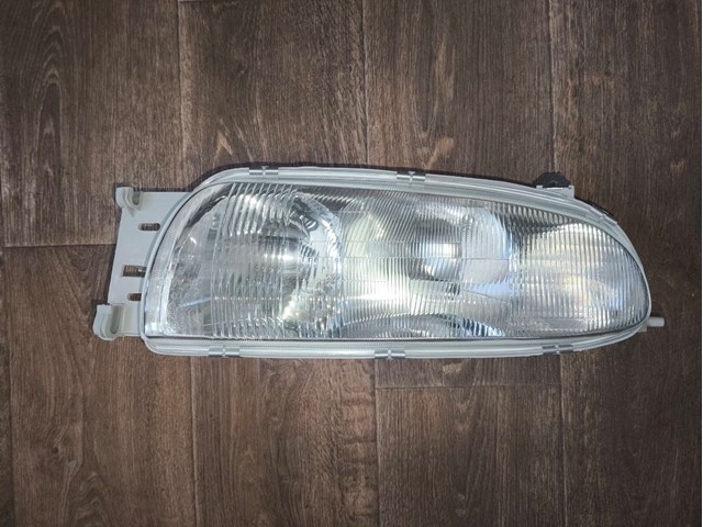 Фара левая передняя 3210094E POLCAR