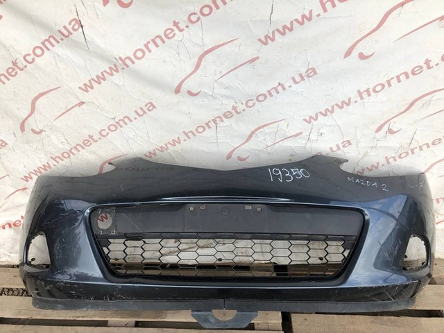 Буфер (бампер) передний D65150031 MAZDA