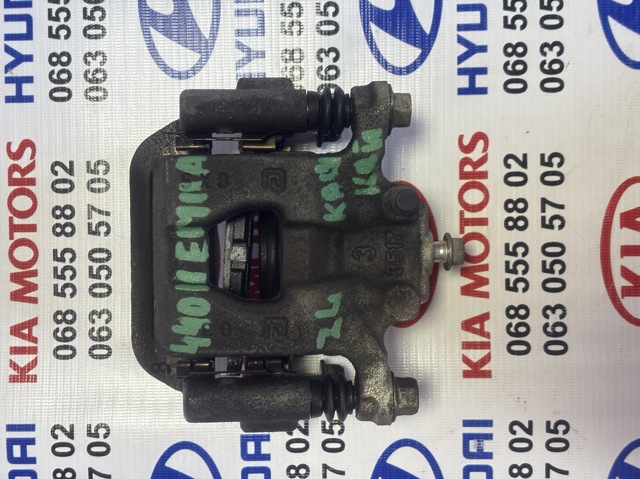 Тормозной суппорт задний левый 44011EM11A NISSAN