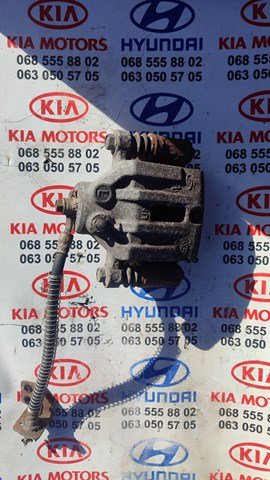Задний левый суппорт 582101D100 HYUNDAI