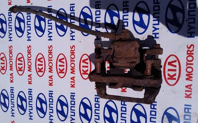 Суппорт тормозной левый задний 582102E360 HYUNDAI