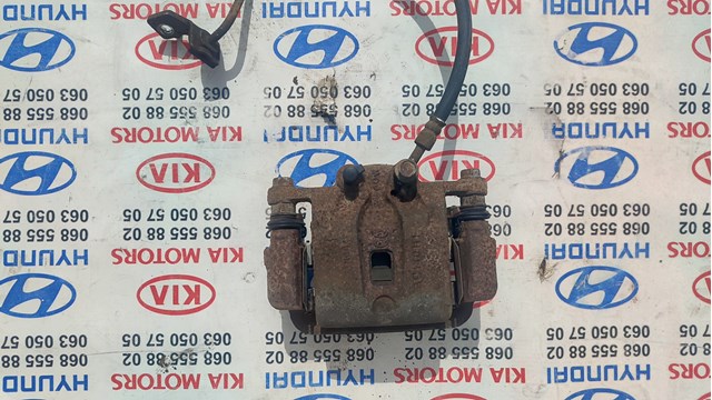 Суппорт тормозной левый задний 582102P700 HYUNDAI