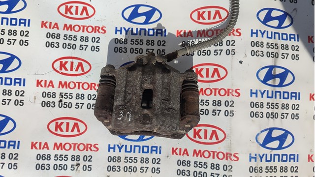 Тормозной суппорт правый задний 582301D100 HYUNDAI