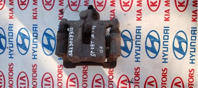 Суппорт тормозной задний правый 582302Y310 HYUNDAI