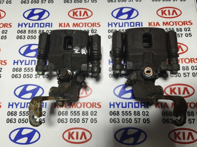 Тормозной суппорт задний левый 583100X300 HYUNDAI