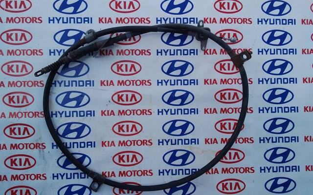 Трос ручного тормоза задний, правый 597703Q300 HYUNDAI