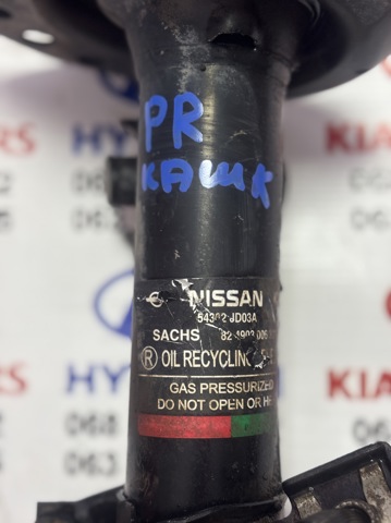 Амортизатор передней подвески правый E4302JD03A NISSAN