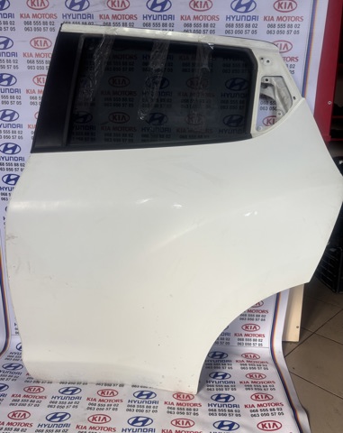 Дверь пассажирская задняя левая H21011KKMD NISSAN