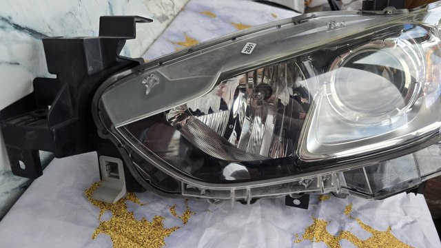 Фара основная левая GHR451040 MAZDA