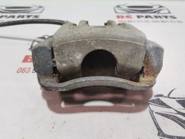 Суппорт тормозной задний правый 582304Z700 HYUNDAI