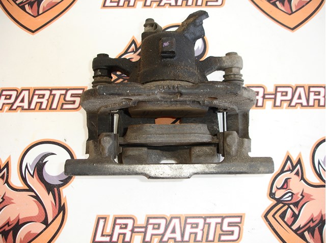 Тормозной суппорт задний левый LR015583 LAND ROVER