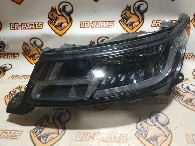Фара левая передняя LR100642 LAND ROVER