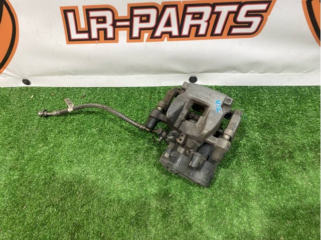 Тормозной суппорт задний левый LR113712 LAND ROVER