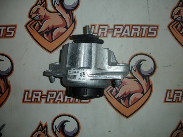 Подушка (опора) двигателя, левая LR141387 LAND ROVER