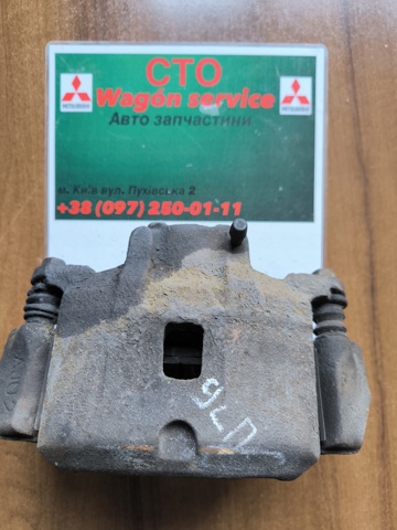 Суппорт тормозной передний левый MR955063 MITSUBISHI