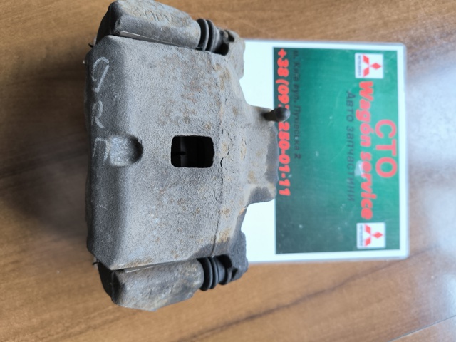 Суппорт тормозной, передний, правый MR955064 MITSUBISHI