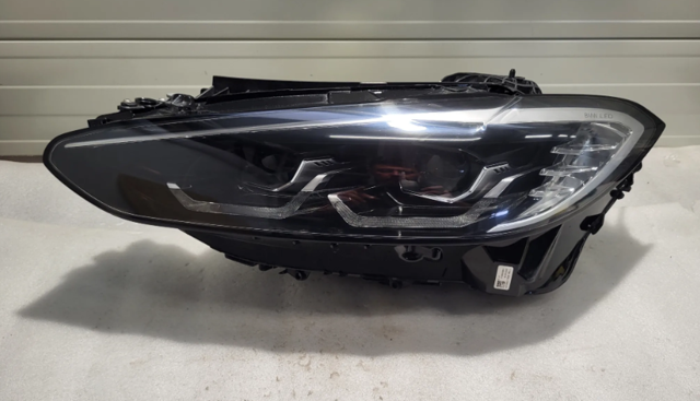 Блок фара левая 63119851039 BMW