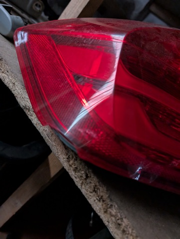 Фонарь задний левый, внешний 63217313039 BMW