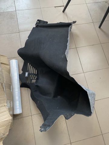 Облицовка багажного отсека, левая 108293200K TESLA