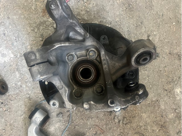 Кулак поворотный левый 28411AN01A SUBARU