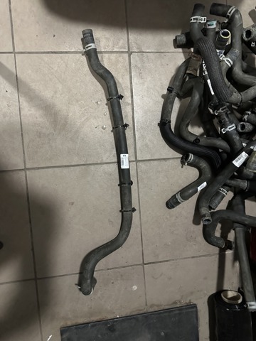 Нижний патрубок радиатора 600735100H TESLA