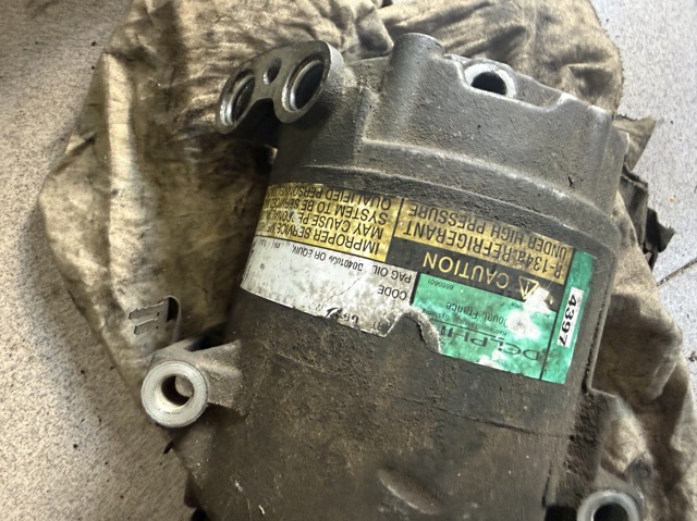 Компрессор климатической установки 1854103 OPEL