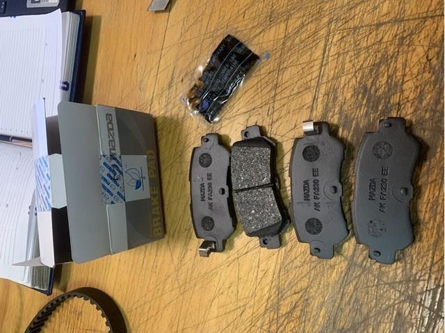 Задние колодки K0Y12648ZA MAZDA