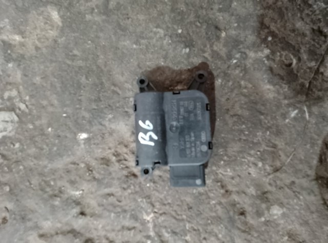 Двигун заслінки печі