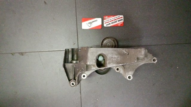 Натягувач приводного ременя