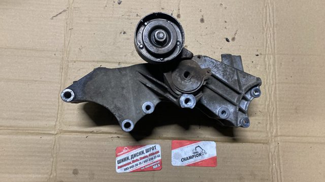 Натягувач приводного ременя