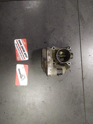 Дросільна заслінка в зборі