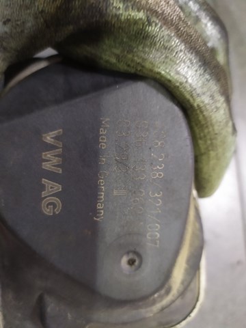 Дросільна заслінка в зборі