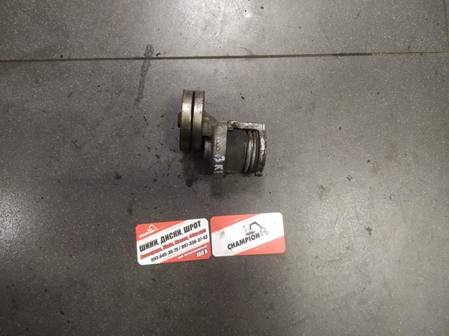 Натягувач приводного ременя