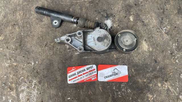 Натяжитель приводного ремня