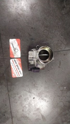 Дросільна заслінка в зборі