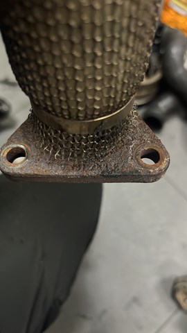 Патрубок колектора