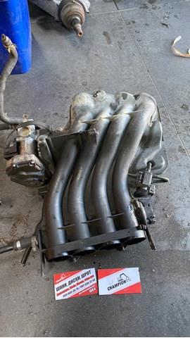 колектор впускний