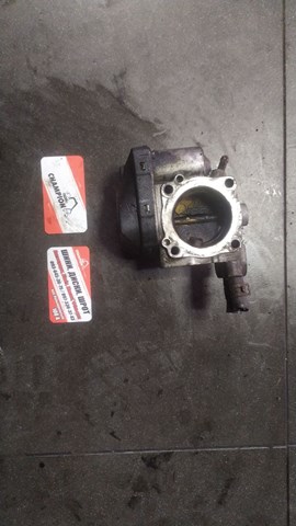 Дросільна заслінка в зборі