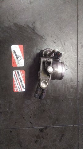 Дросільна заслінка в зборі