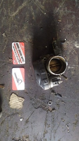 Дросільна заслінка в зборі