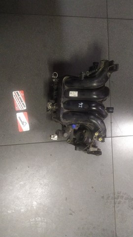 Колектор впускний